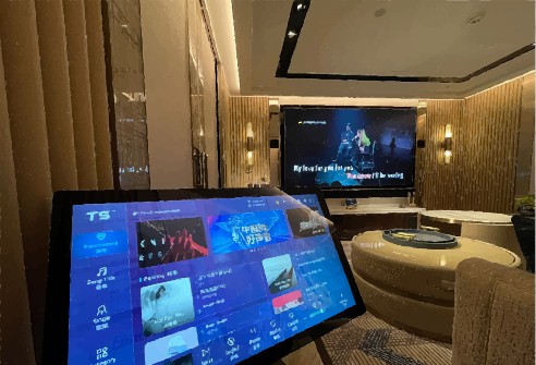 KTV room with tablet control and cinema screen at Marina Bay Sands