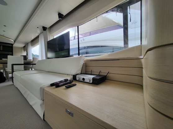 Yacht stateroom with a KamoGa amplifier and wireless microphones