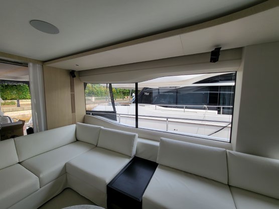 Yacht lounge opening to the deck with a KamoGa system